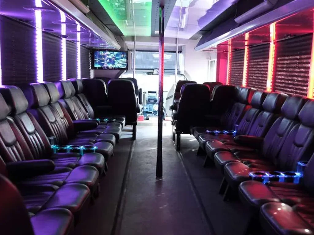 Party bus interior lounge with blue ambient lighting