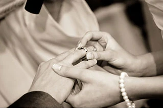 Wedding rings during a ceremony moment.